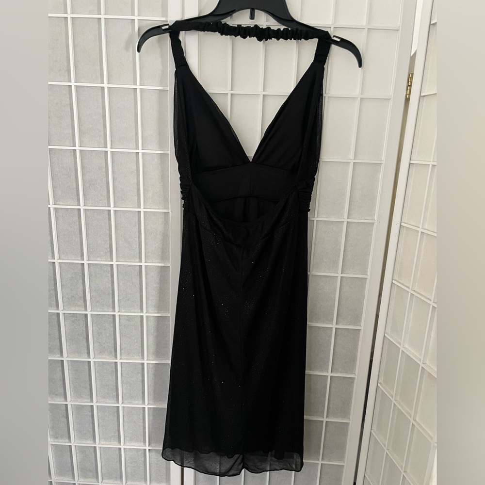 Black cocktail dress size small halter backless knee-lenght